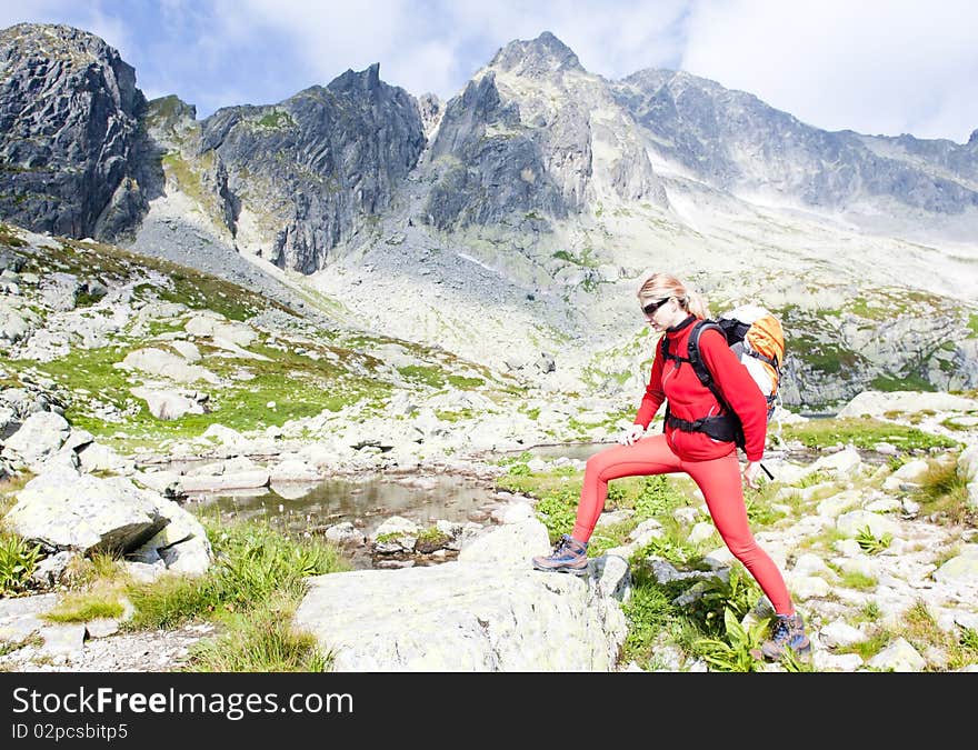 Woman backpacker at Five Spis Tarns, Vysoke Tatry (High Tatras), Slovakia