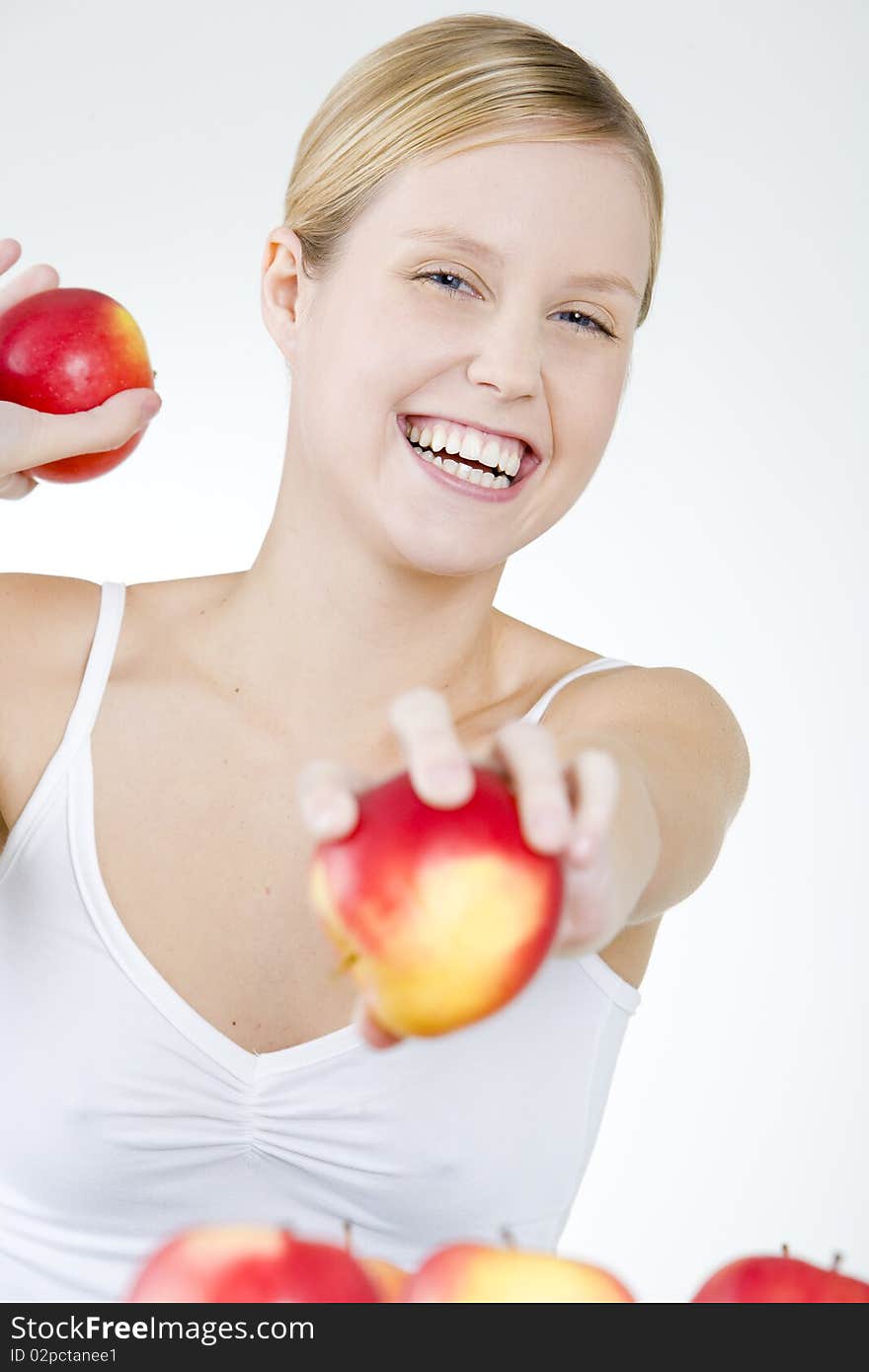 Portrait of woman with apples