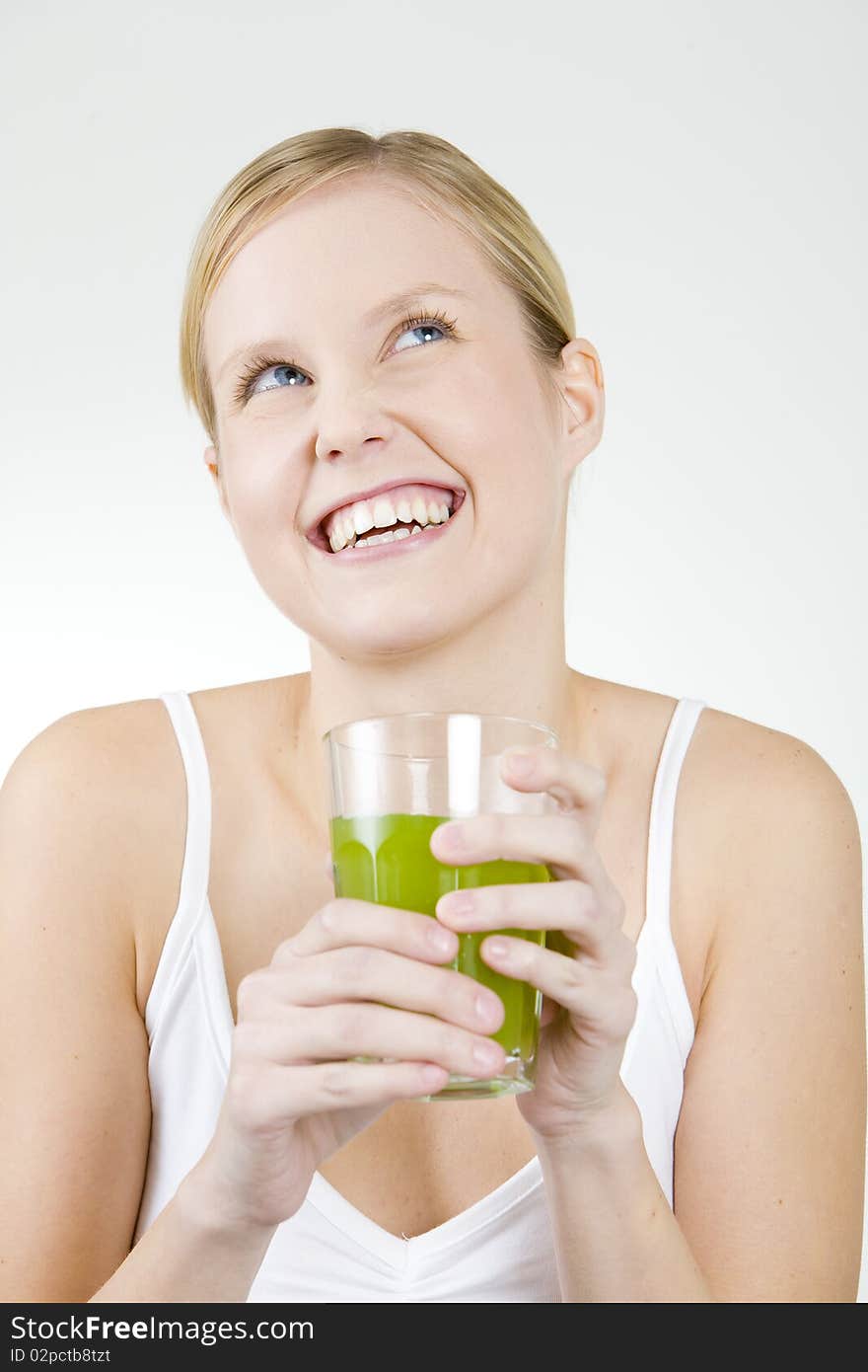 Portrait of woman with a glass of juice