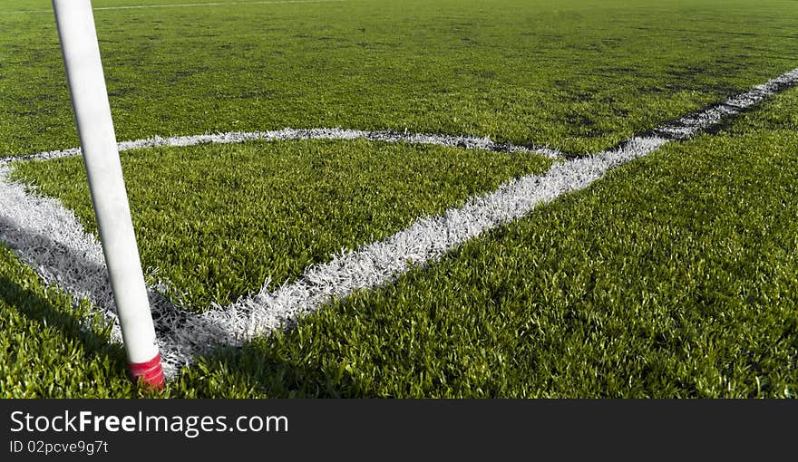 Corner kick in a plastic grass soccer field