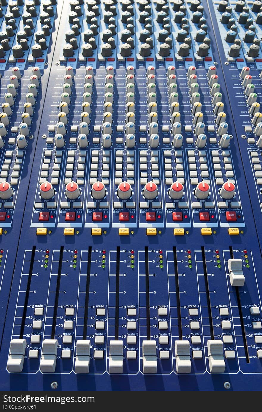 Big mixer console in a concert stage