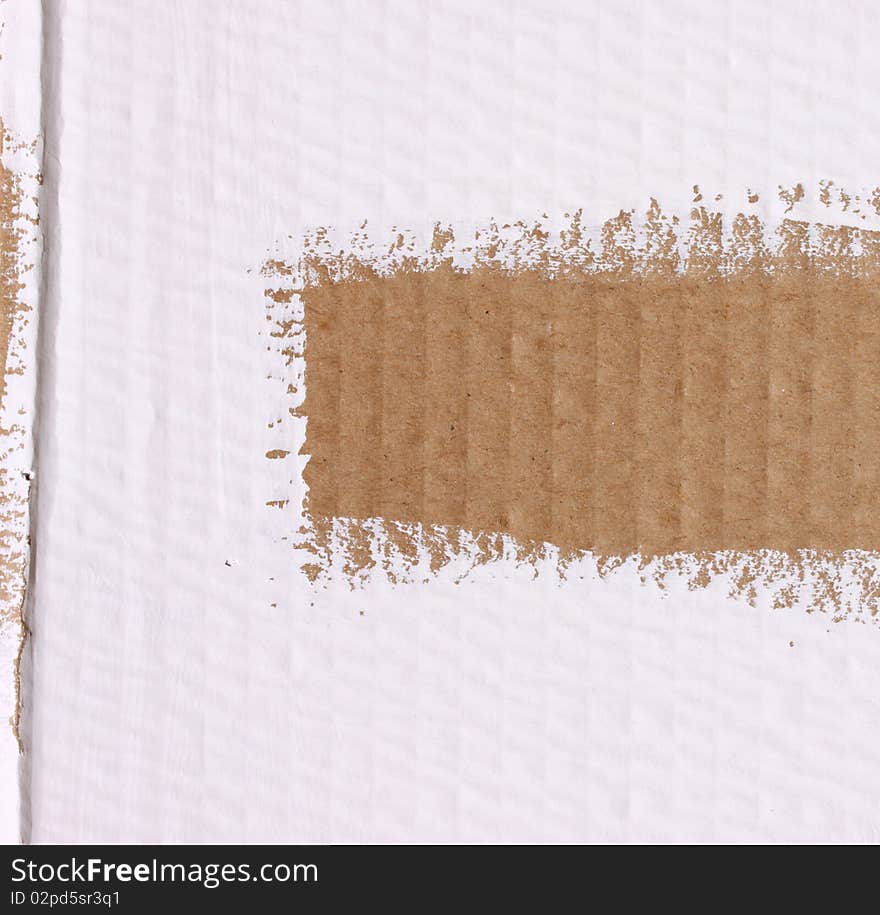 Close up of cardboard with brush lines