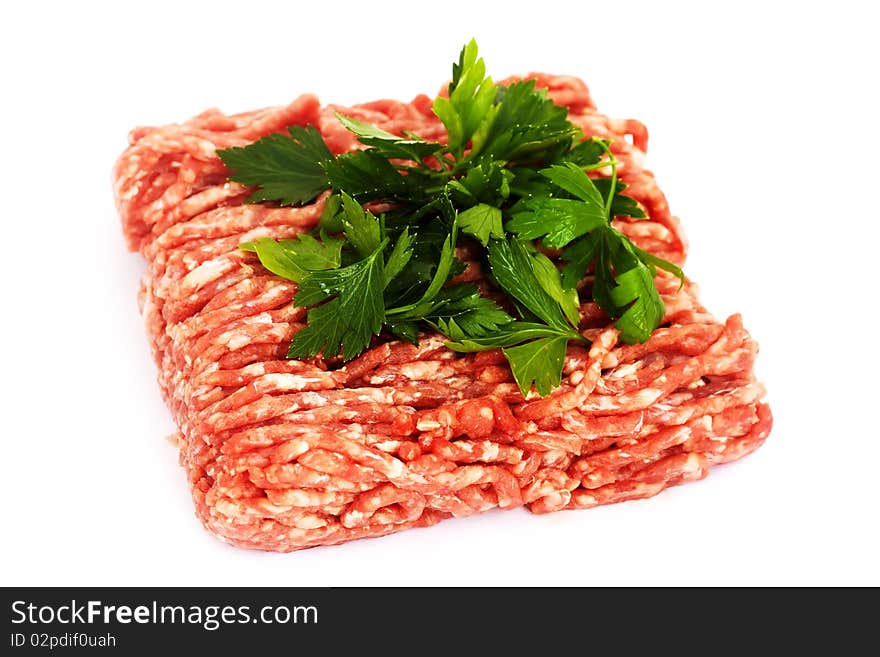 Shot of some minced meat with parsley, isolated on white background