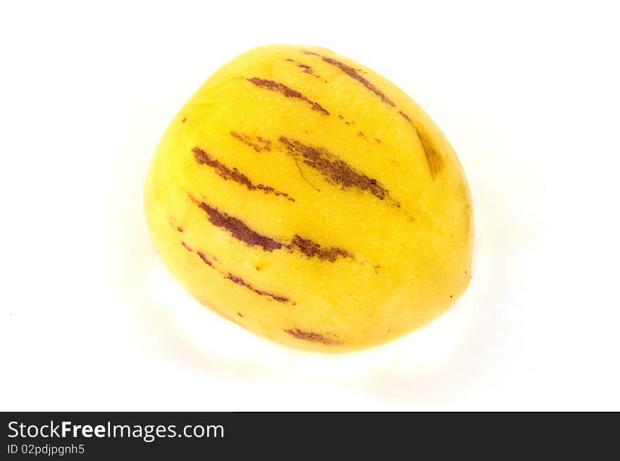 Single pepino tropical fruit isolated on white background