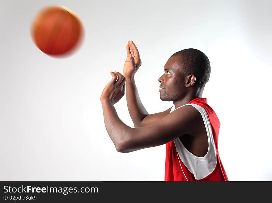 Young black man playing basketball. Young black man playing basketball