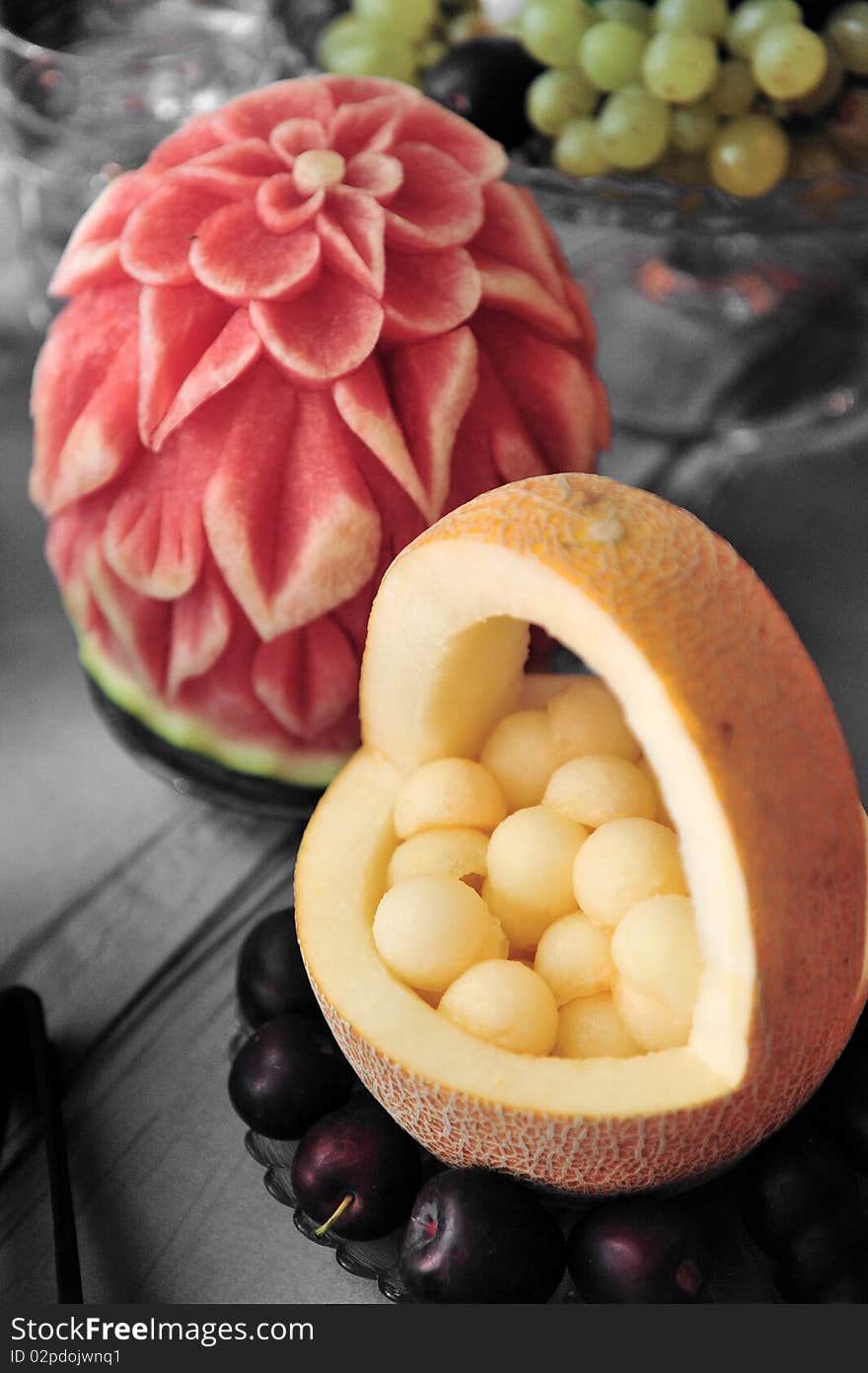 Fruit plate with bananas,kiwis, pineapples, apples, grapes