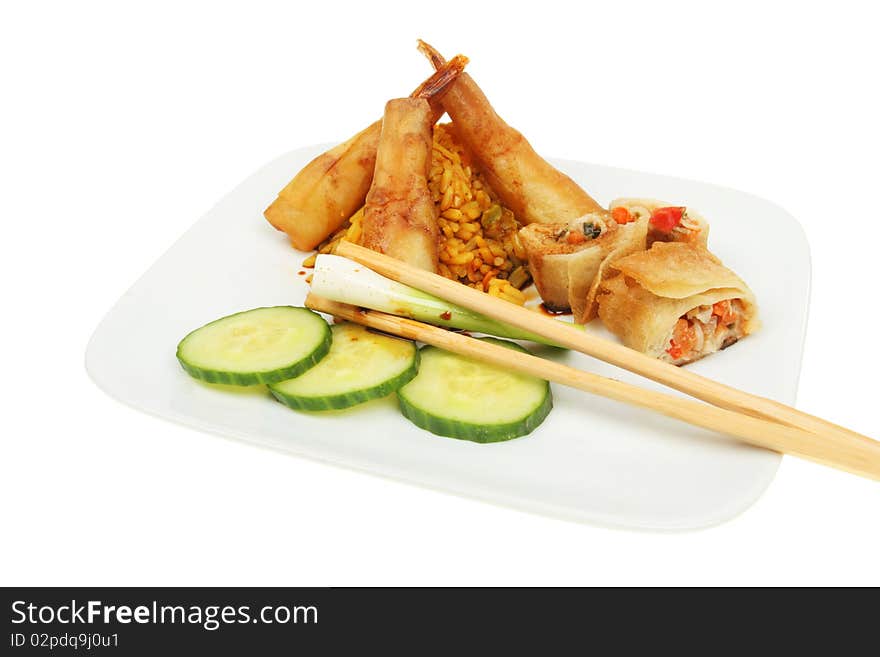 Chinese snacks, prawns and spring rolls on a plate. Chinese snacks, prawns and spring rolls on a plate