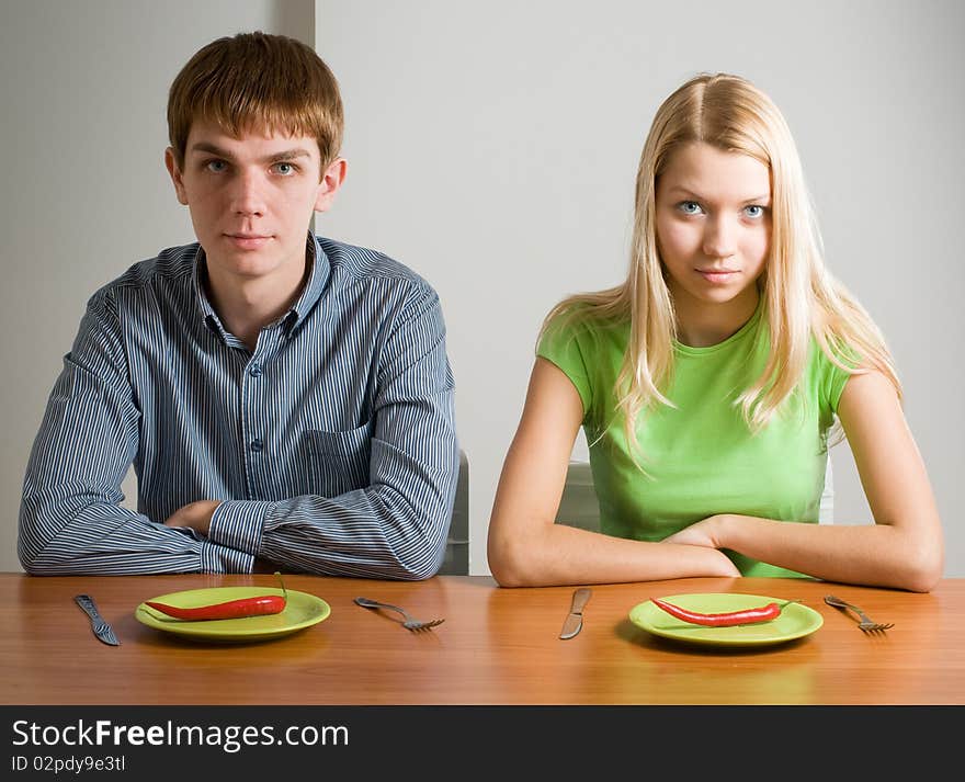 Funny family with red peppers. Funny family with red peppers