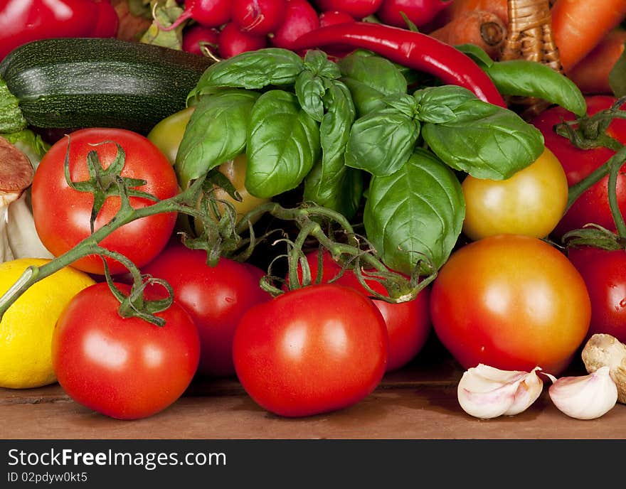 Full frame photograph of a broad variety of vegetables; colorful and plentiful. Full frame photograph of a broad variety of vegetables; colorful and plentiful