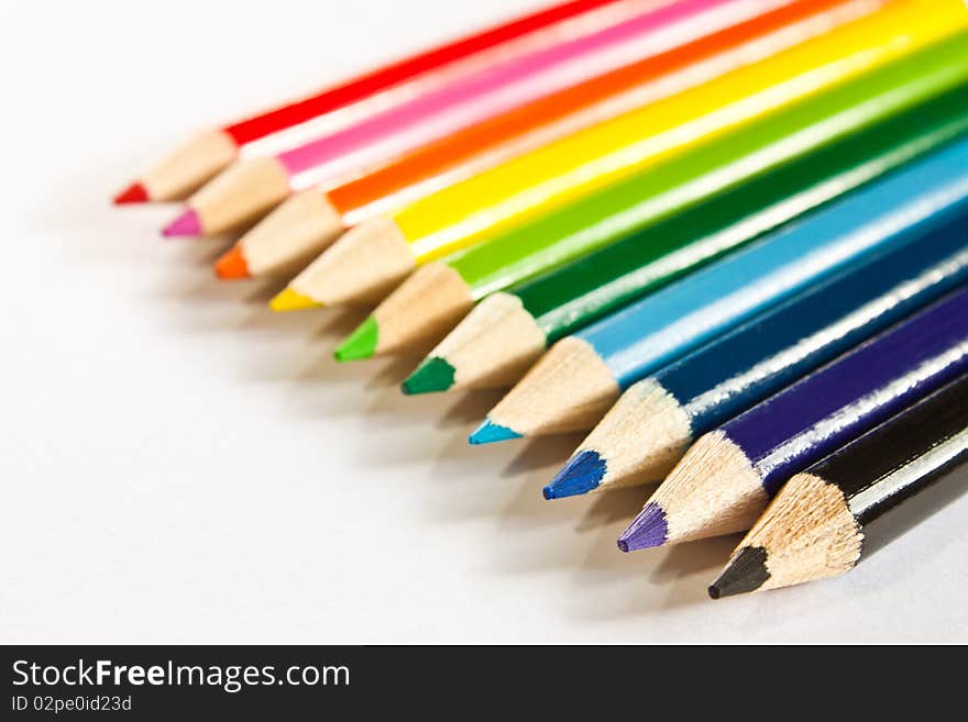 Row of rainbow colored pencils