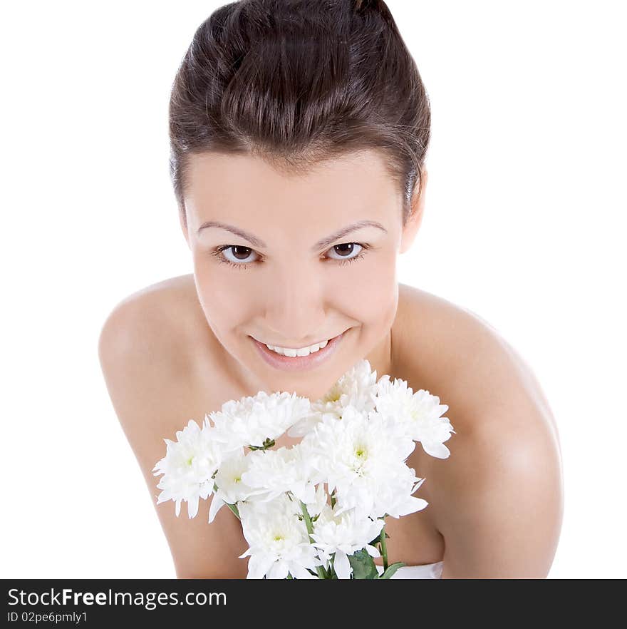 Beautiful portrait of a young sexy woman with a white flower.