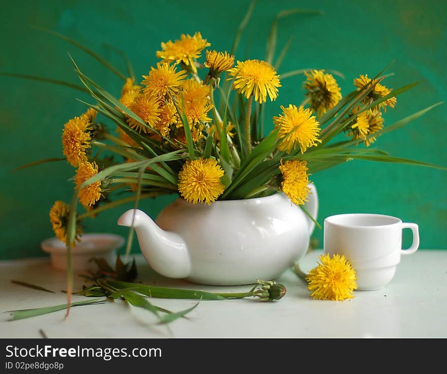 still life with dandelions in a tea-pot