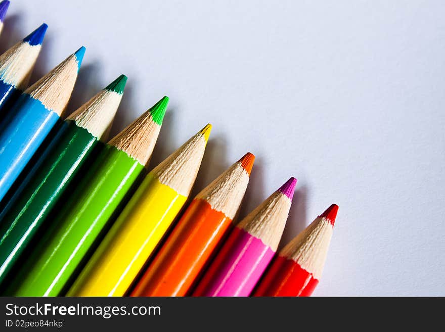 Row of rainbow colored pencils