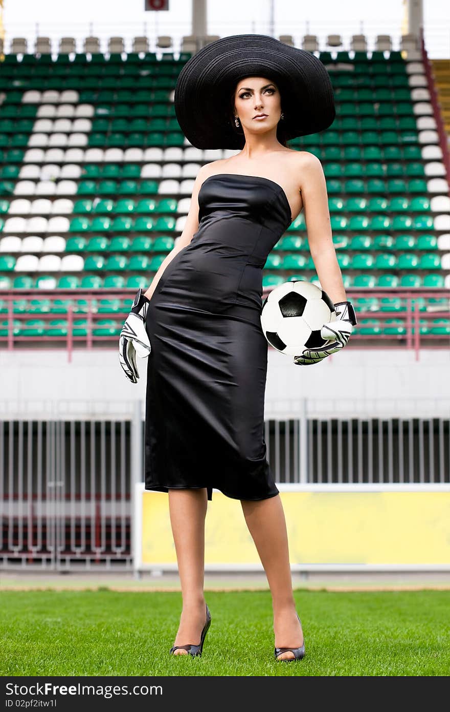 Elegant woman with Football ball