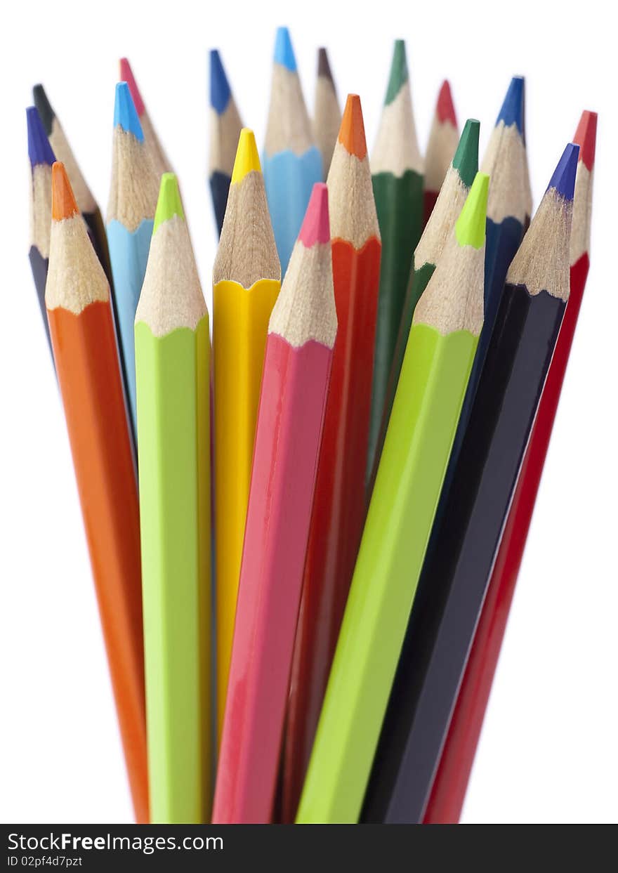 A bunch of color pencils pointing up. A bunch of color pencils pointing up.