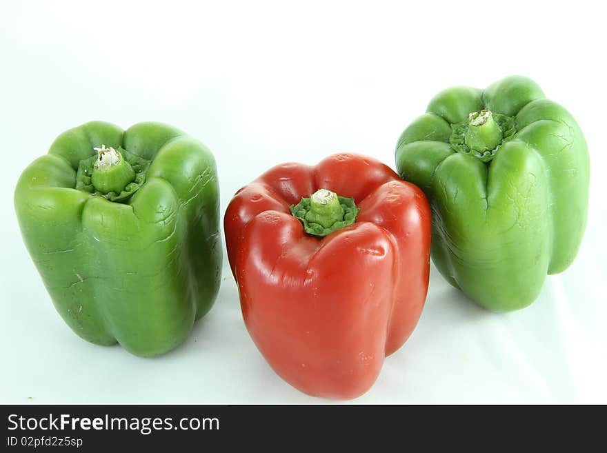 Red bell pepper and Green bell papper isolated on white. Red bell pepper and Green bell papper isolated on white