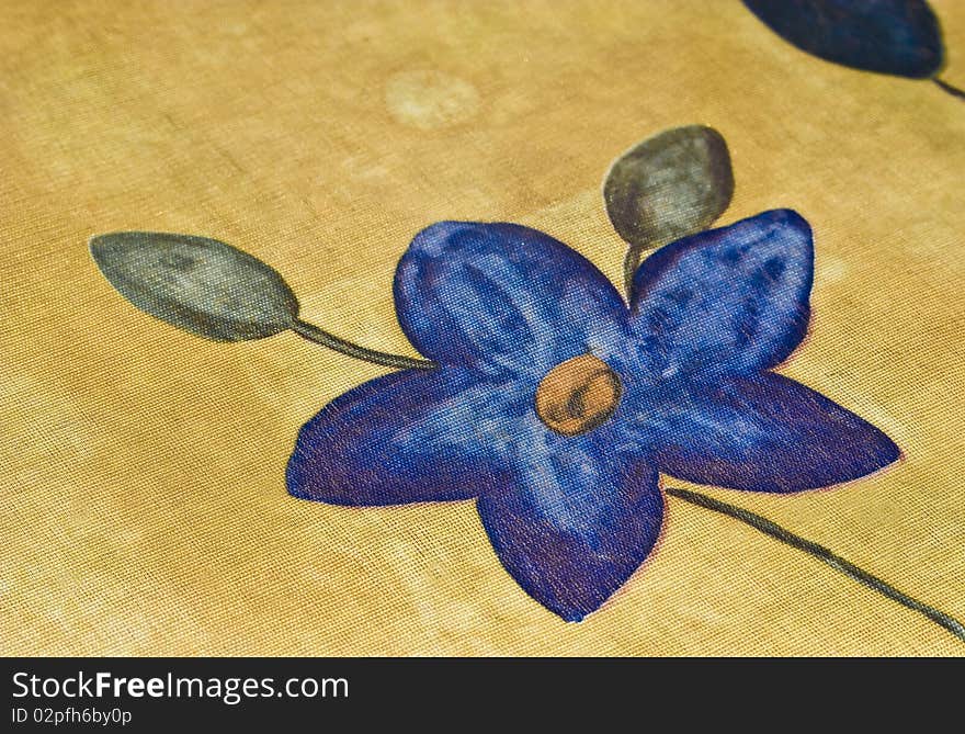 Rubber sheet with blue floweron the front