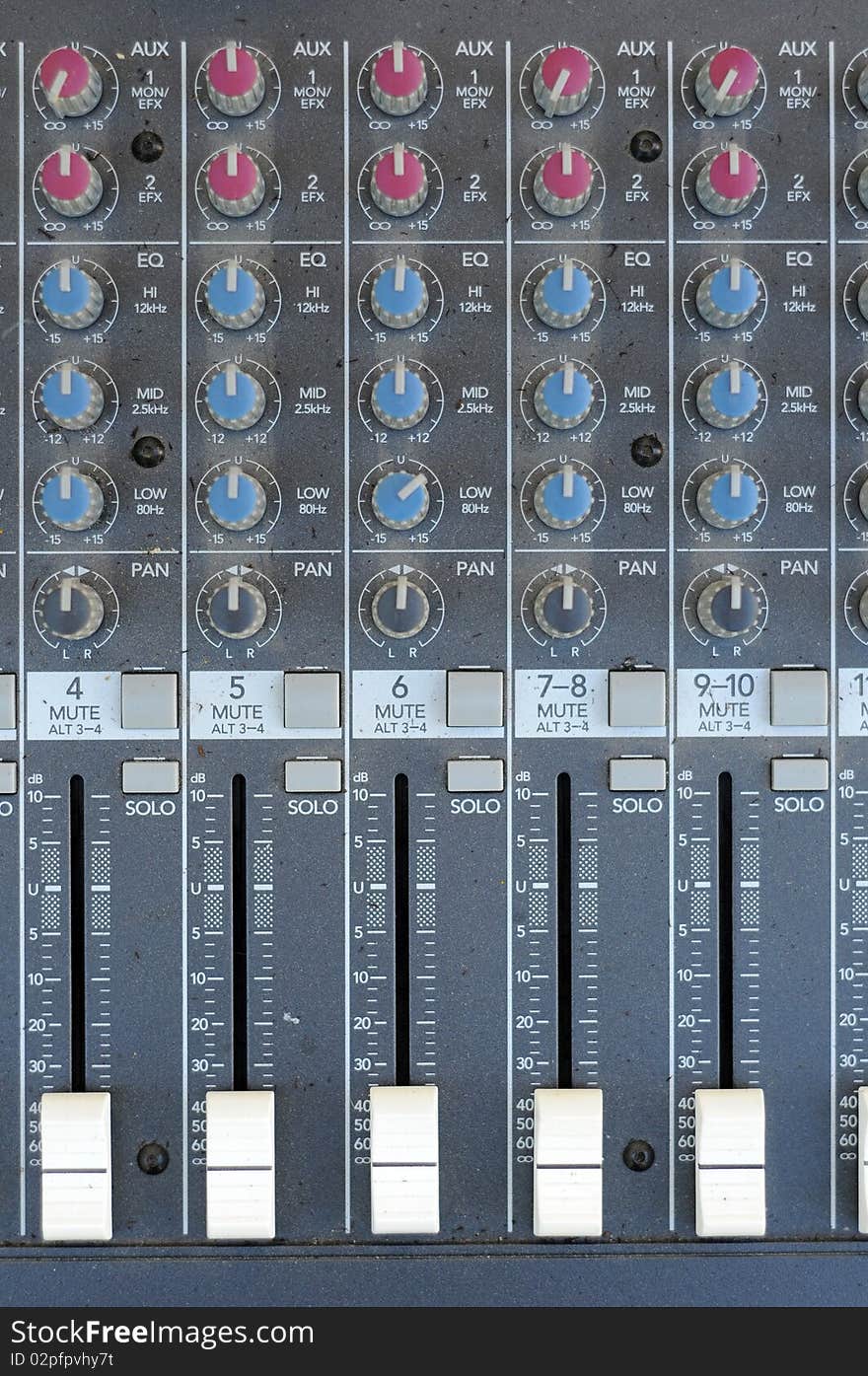 A multi-channel hardware audio mixer with microphone. A multi-channel hardware audio mixer with microphone.