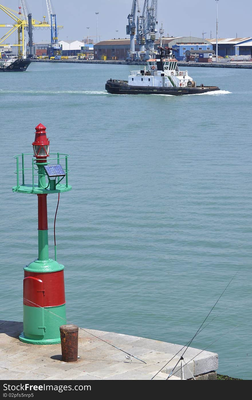 Tug end lighthouse in the harbor of Livorno. Tug end lighthouse in the harbor of Livorno