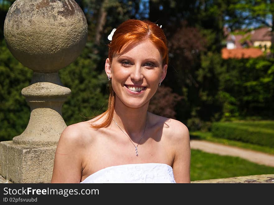 Portrait of young bride at the garden. Portrait of young bride at the garden