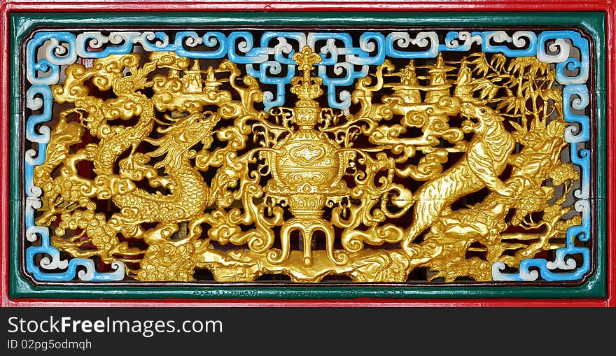 Gold pattern on a piece of carved wood Chinese art ,generality in thailand , any kind of art decorated in budhist church ,temple pavilion ,temple hall ,monk's house petc .created with money donated by peole to hire artist .they are public domain or treasure off buddhism , no restrict in copy or use ,no name of artist appear (but,if there is artist name , it only for tell who is the artist of work , not for copyright). this photo is taken under these conditions. Gold pattern on a piece of carved wood Chinese art ,generality in thailand , any kind of art decorated in budhist church ,temple pavilion ,temple hall ,monk's house petc .created with money donated by peole to hire artist .they are public domain or treasure off buddhism , no restrict in copy or use ,no name of artist appear (but,if there is artist name , it only for tell who is the artist of work , not for copyright). this photo is taken under these conditions