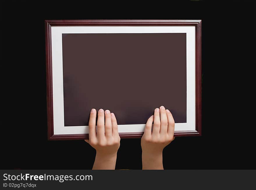 Simple wooden Frame in hands