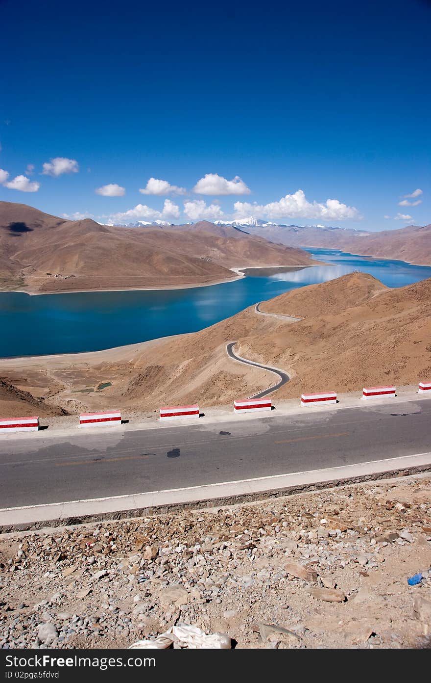 Blue lake with surrounding mountains in great tibet area. Blue lake with surrounding mountains in great tibet area