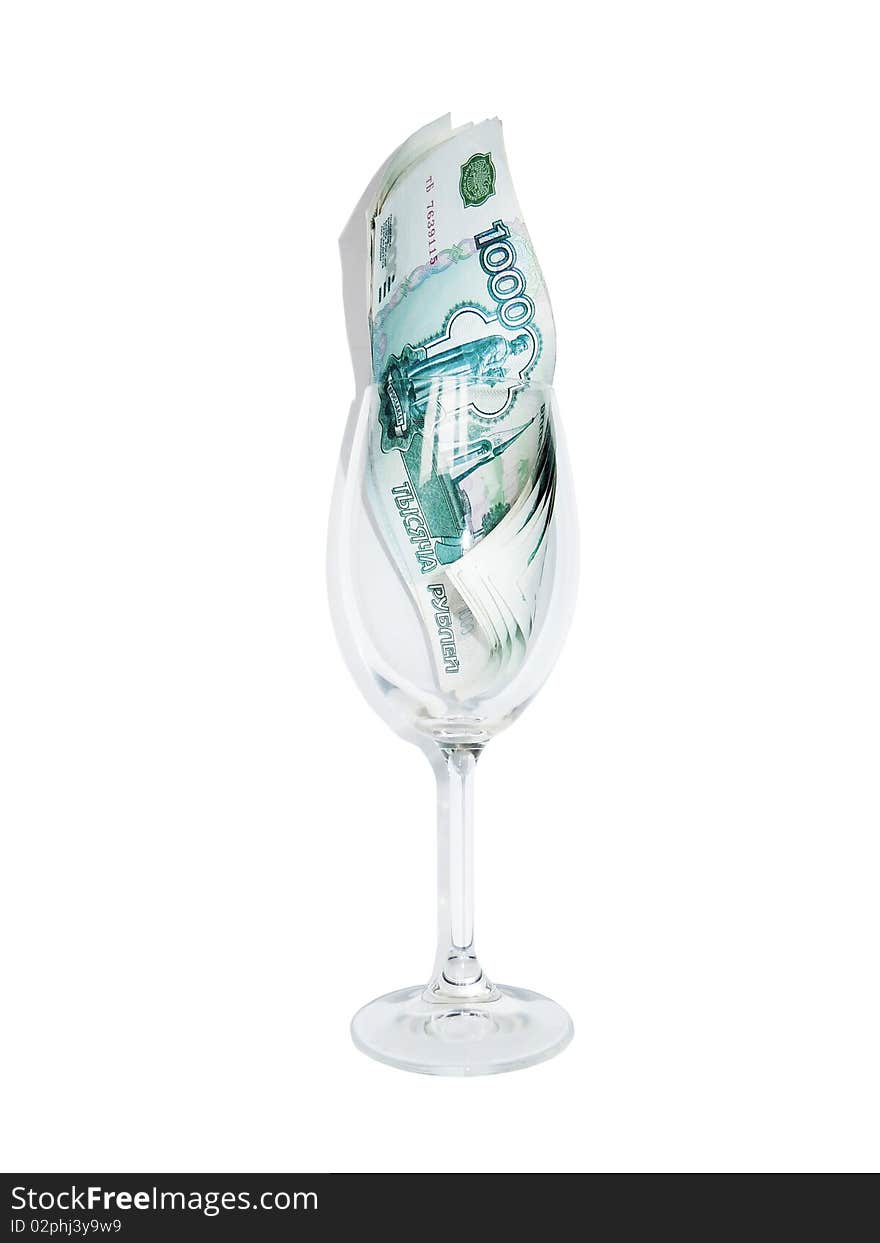 Money in the glass on a white background.