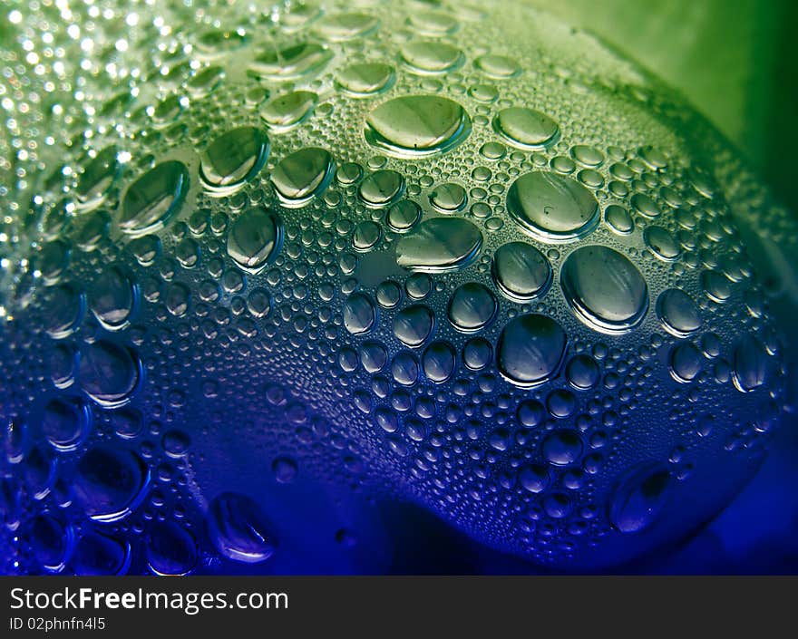 Water drops green and blue shaded background. Water drops green and blue shaded background