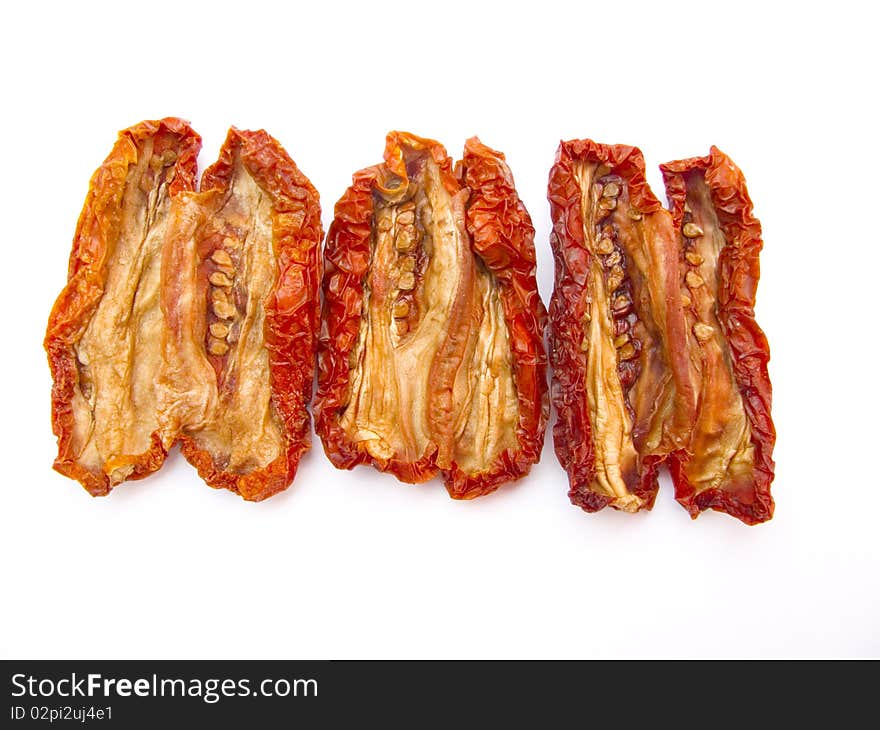 Dried tomatoes isolated on white background