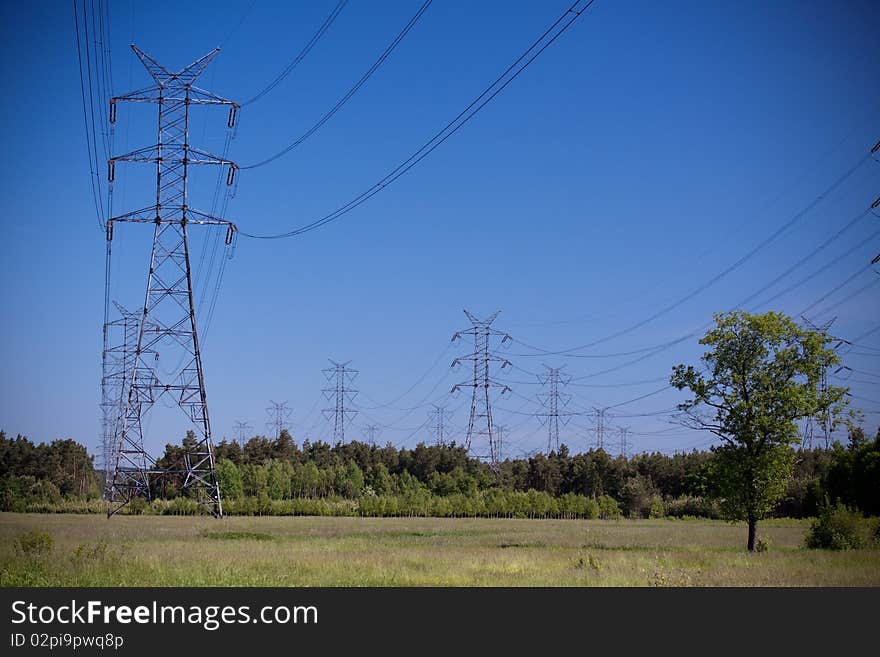 Power lines on blue sky