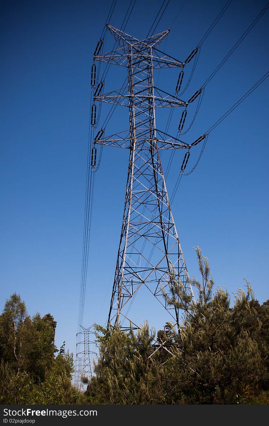 Power lines on blue sky