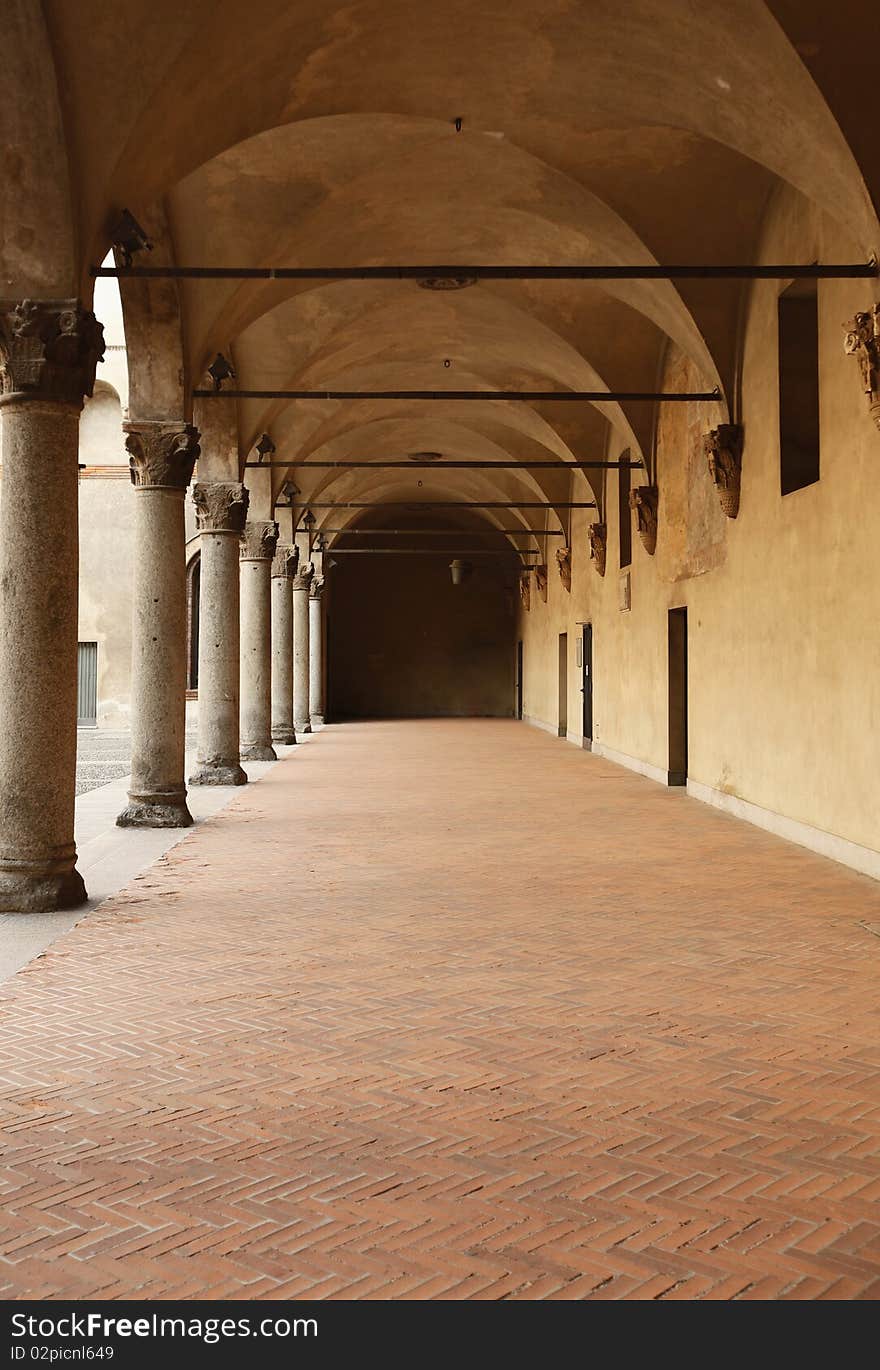 The arch structure of Rocchetta square inside Sforza Castle / Castello Sforzesco in Milan, Italy. The arch structure of Rocchetta square inside Sforza Castle / Castello Sforzesco in Milan, Italy.