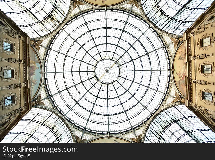 The famous iron structure and glass-vaulted arcades of Galleria Vittorio Emanuele II in Milan, Italy.