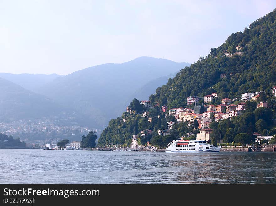 Residential buildings adorn the hillside around Lake Como in Italy.