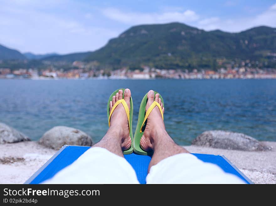 Sitting by the lakeside enjoying the sun. Sitting by the lakeside enjoying the sun