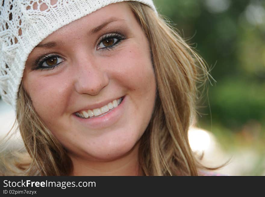 Beautiful girl enjoying a summer day in the park.