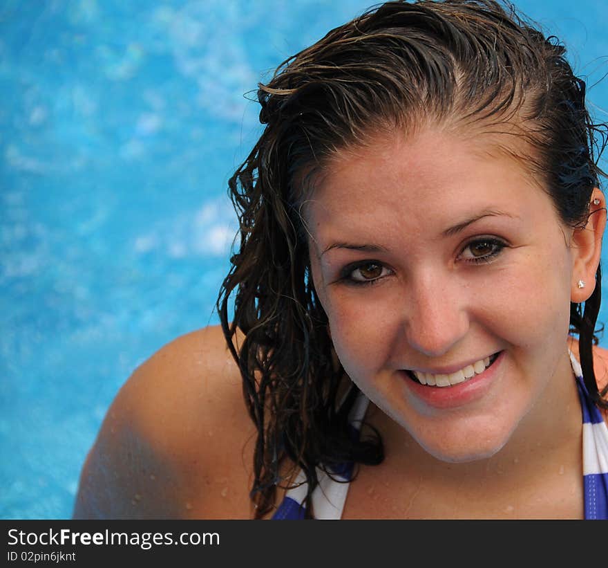 Beautiful girl enjoying a day at the pool. Beautiful girl enjoying a day at the pool.