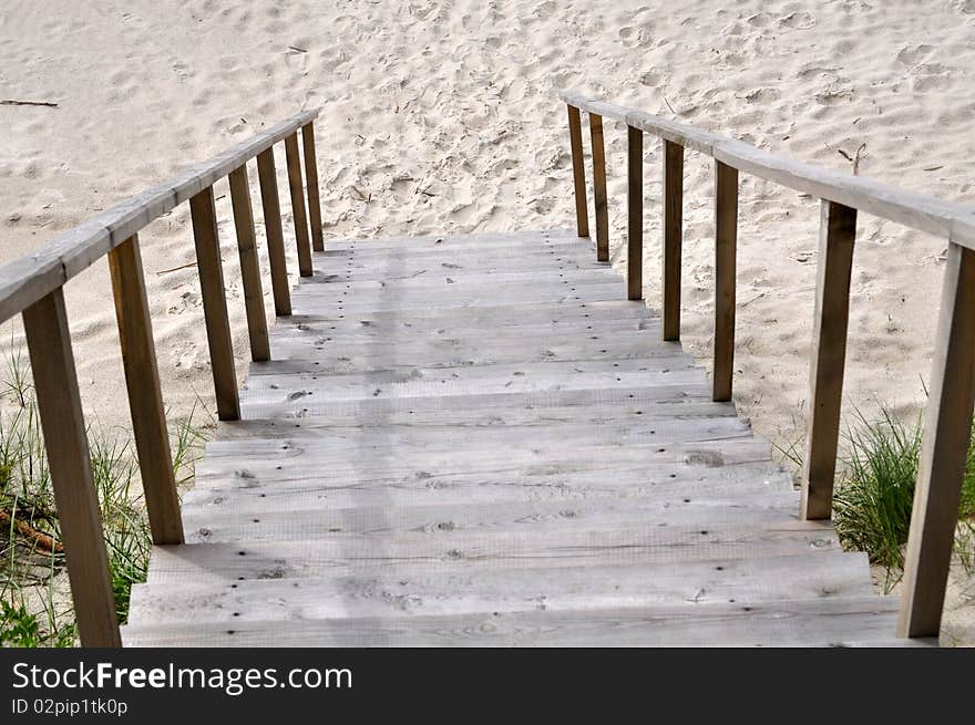 The steps down to sand beach. The steps down to sand beach