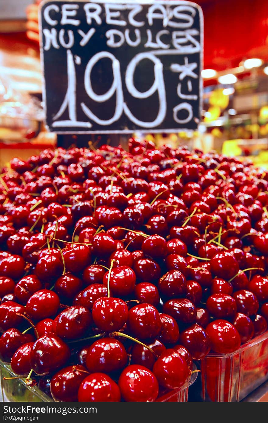 Cherries on sale at La Boqueria Market in Barcelona, Spain.