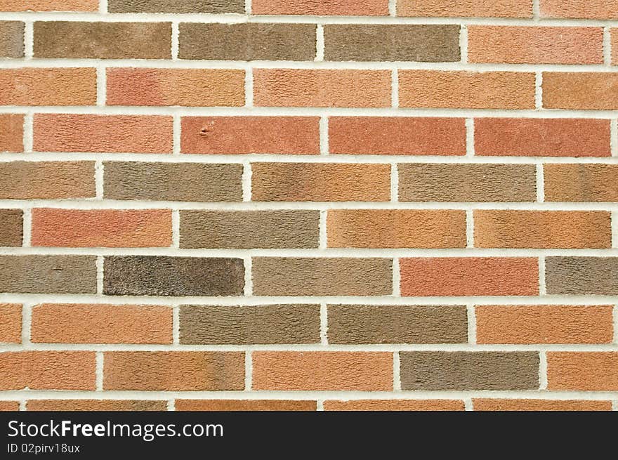 Wall with different colors of textured brick. Wall with different colors of textured brick