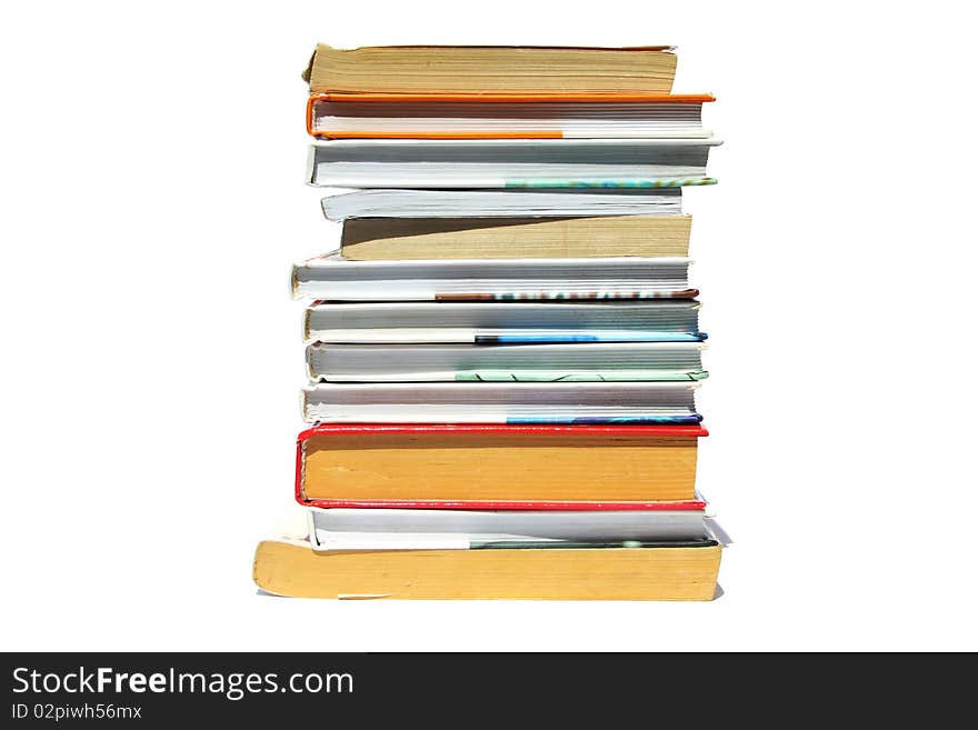 Several books and textbooks on a white background. Several books and textbooks on a white background