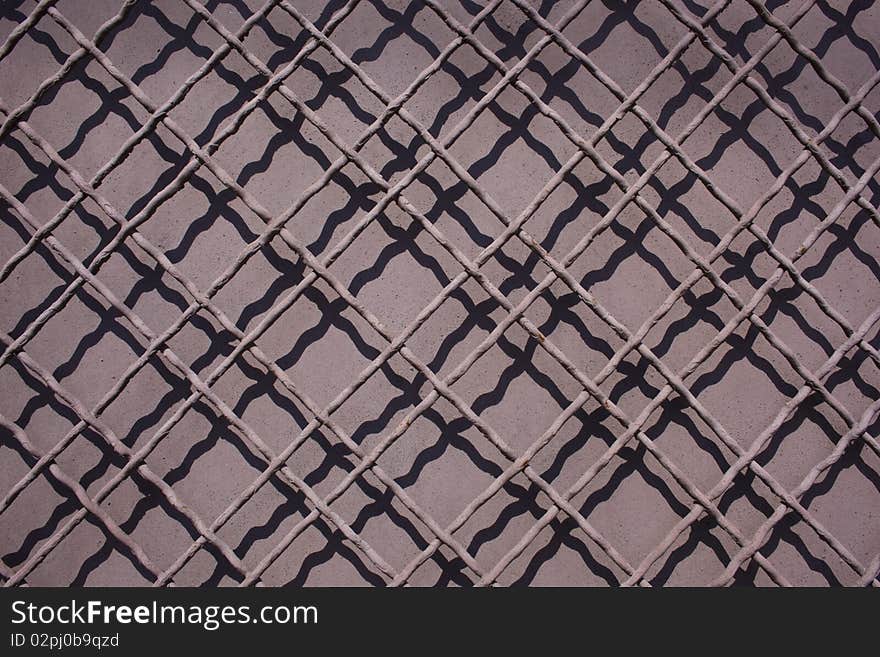 Metal fence with painted background