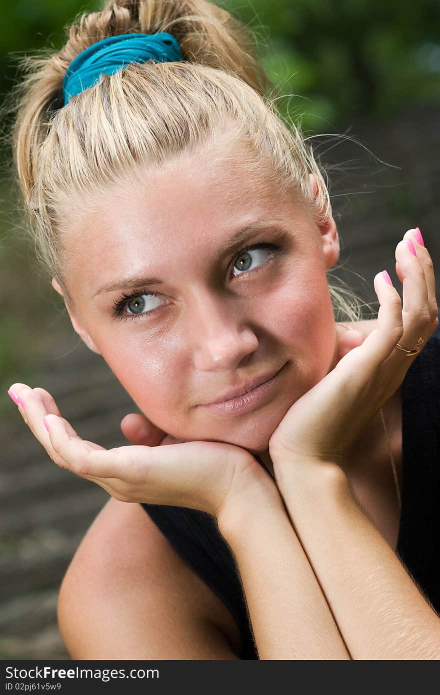 Closeup photo of attractive young woman. Closeup photo of attractive young woman