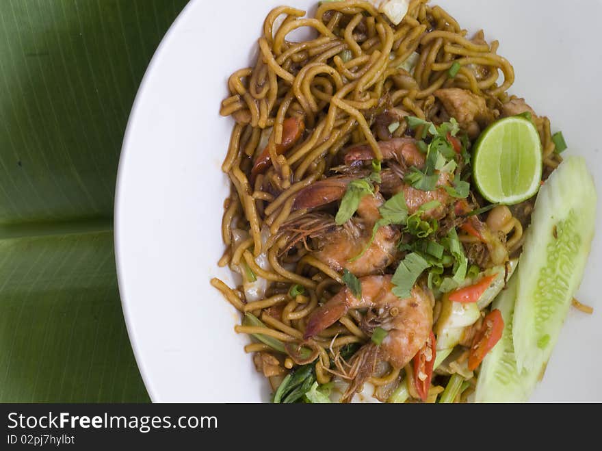 Fried noodles on banana leaves