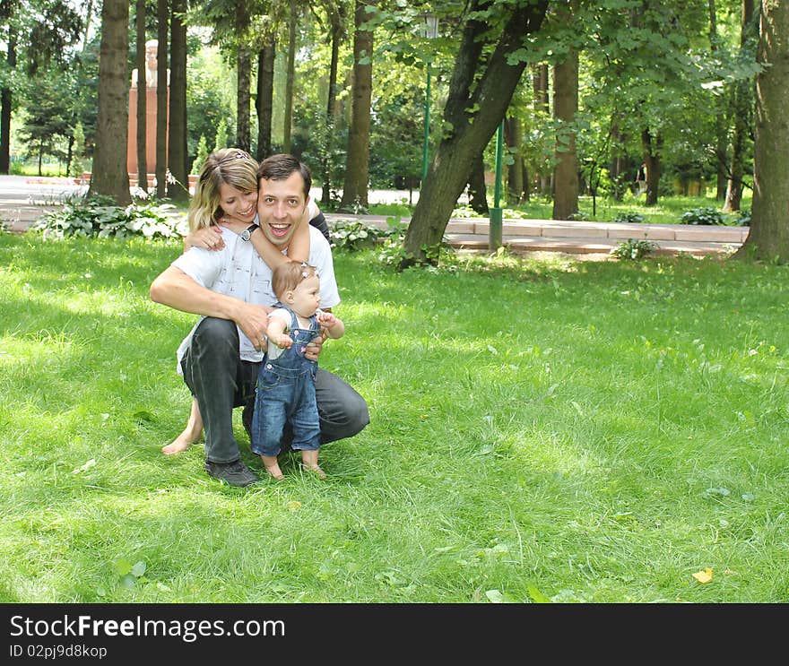 Young family have a rest in park