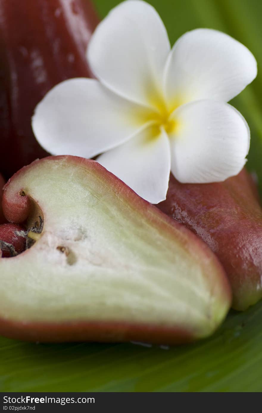 Cut fruit on banana leaves