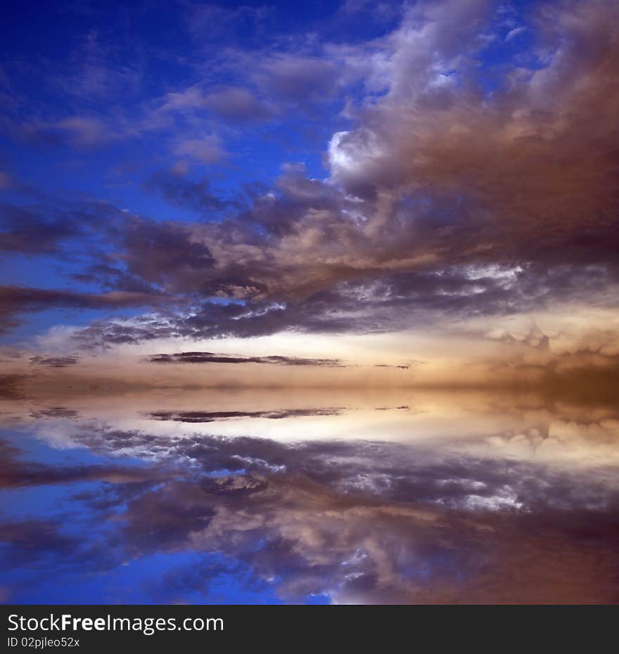 A beautiful cloudy sky with reflection. Abstract background.