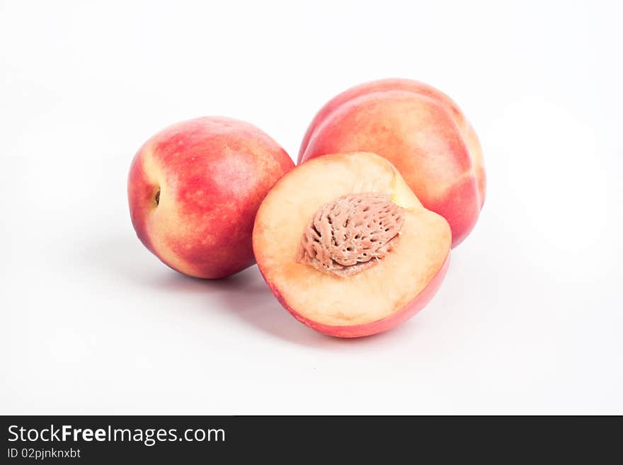 Peaches on a white background