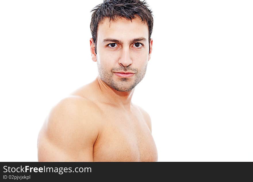 Bearded young man posing on white background